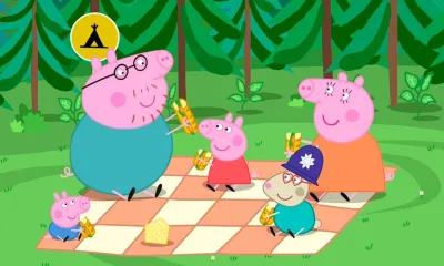 Pig family enjoying a picnic outdoors
